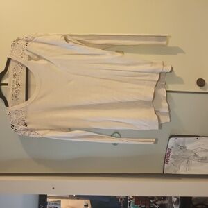 Vanilla colored light sweater size L, it's a small large.